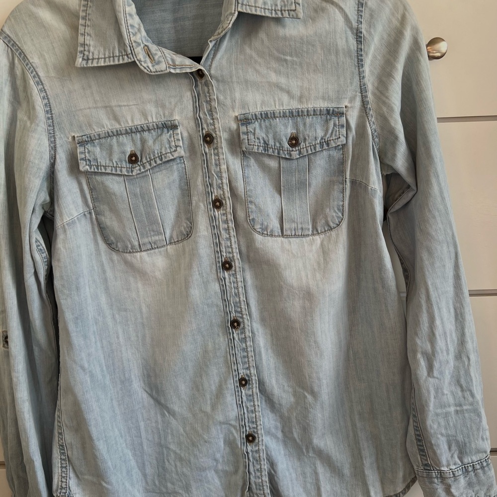 A light denim button up shirt from Full Tilt in a size S